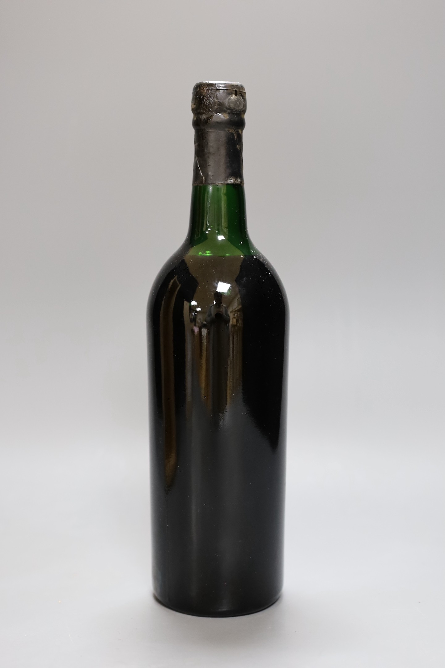 A cased bottle of Cockburns 1970 vintage port.